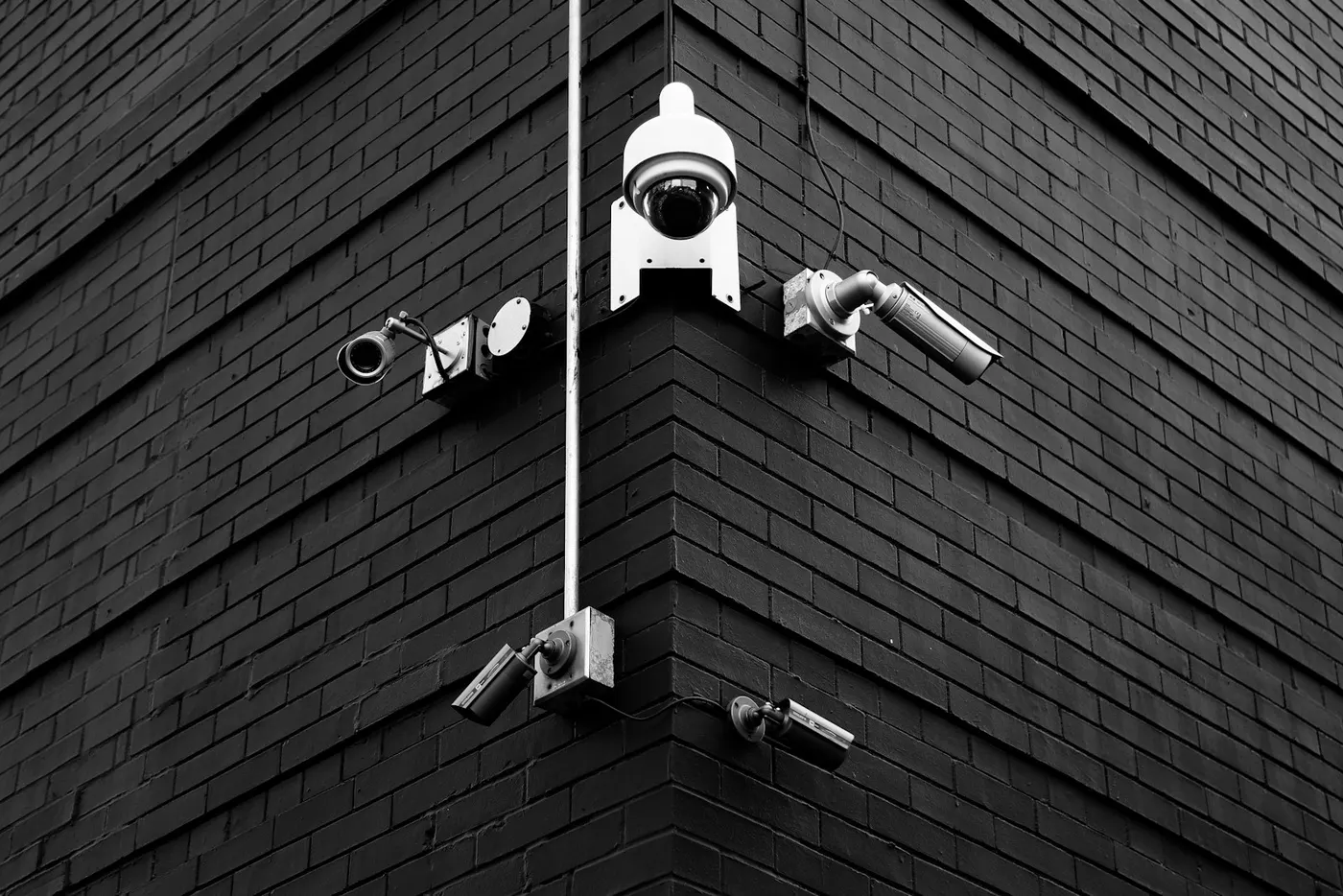 CCTV surveillance cameras mounted on a building corner